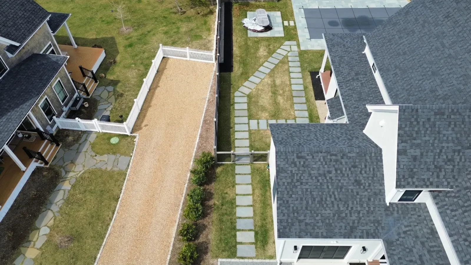 Natural stone walkway through the lawn
