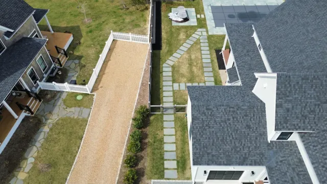 Natural stone walkway through the lawn