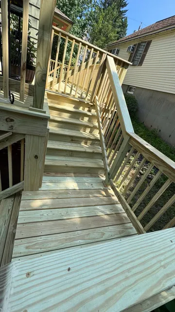 New pressure-treated exterior stairs seen from above