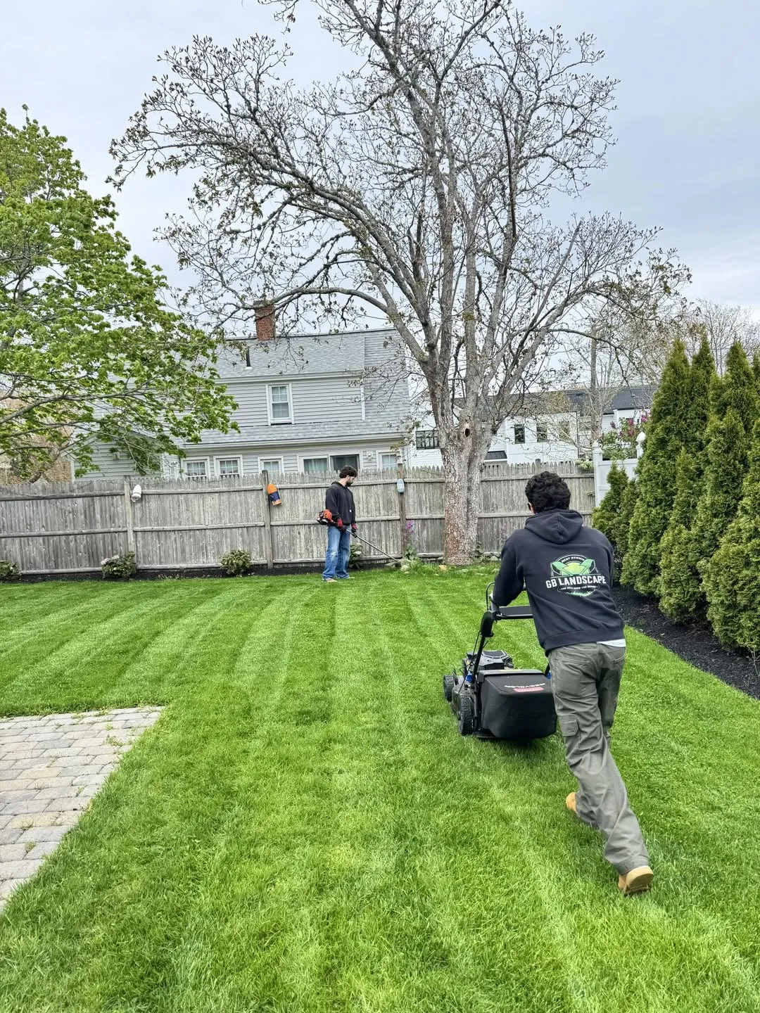 Crew mowing a lawn