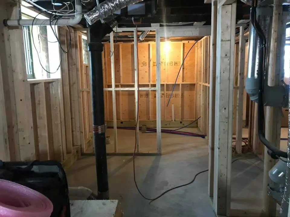 Basement framing around original brick chimney