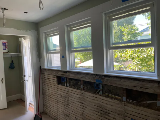 Rewiring in progress in a renovated room
