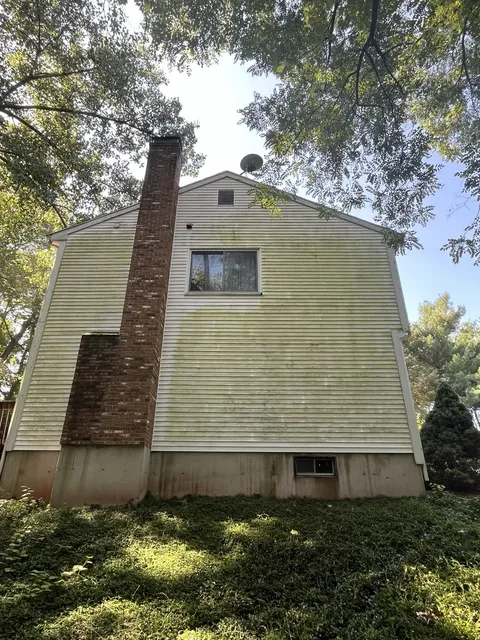 House exterior before professional soft washing