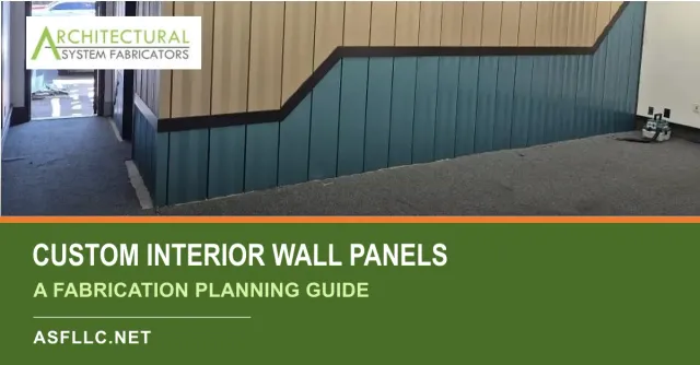 Two-tone custom interior wall-panel layout with lighter upper panels, blue lower panels, and dark transition trim.