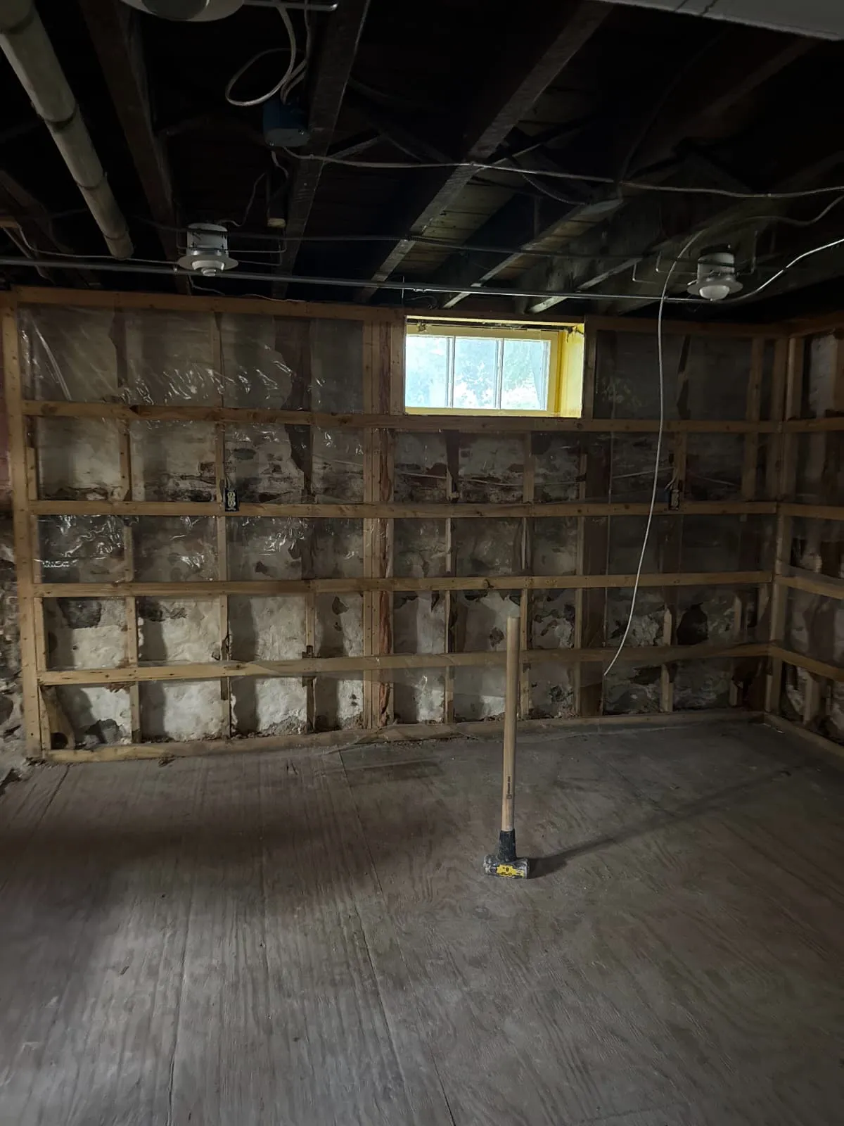 Interior basement demolition and debris removal project in Boston, MA