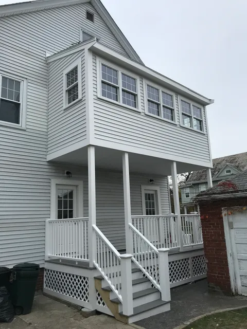 Multi-story home exterior renovation