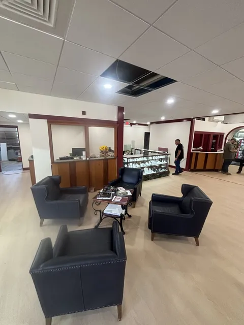Seating area and sales counter on the finished jewelry store floor in Concord, NH