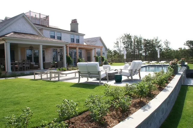 Luxury outdoor living space with pool, pergola and patio built by Chilton Development