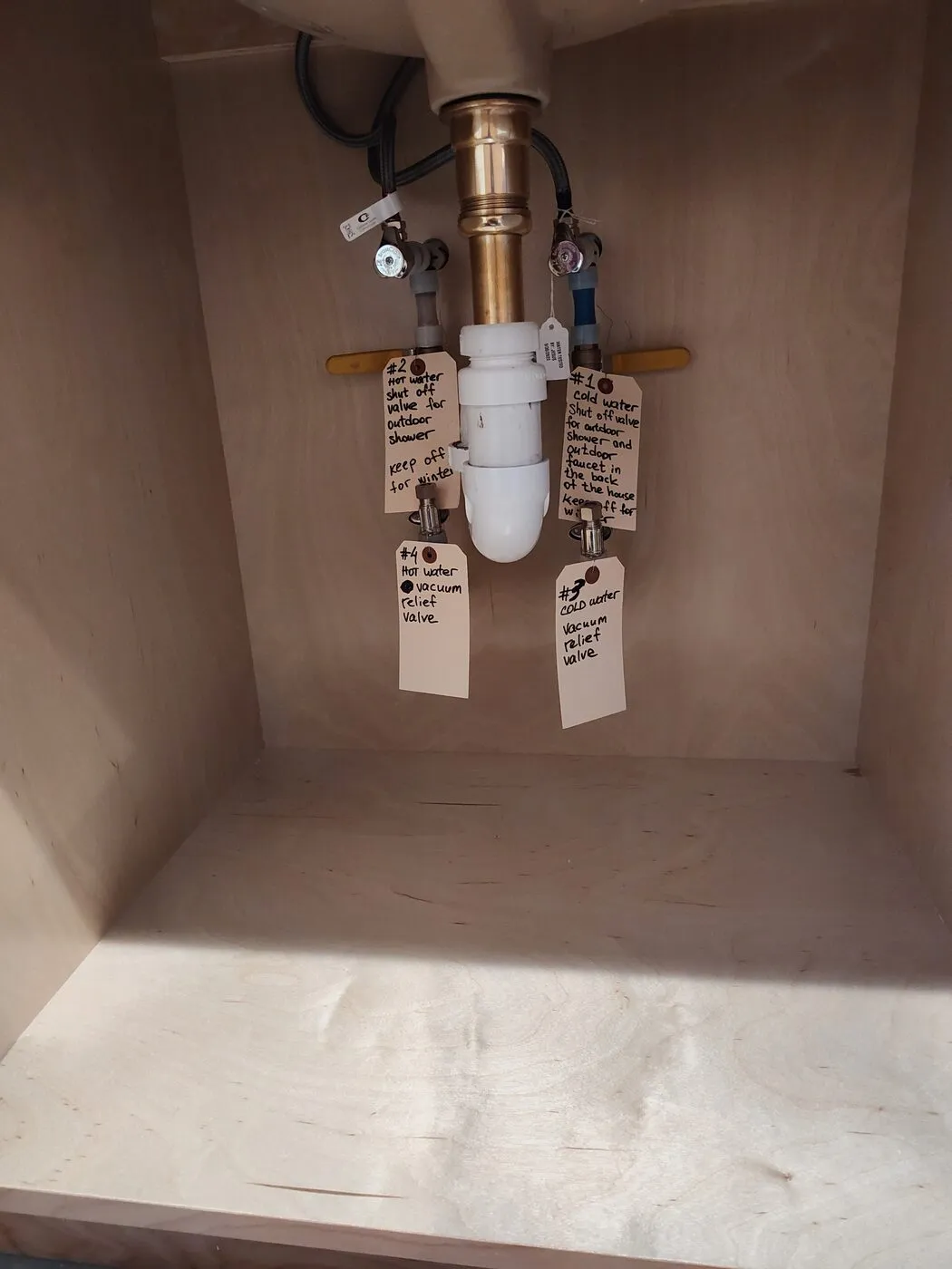 Bathroom shower and tub valve rough-in with copper supply lines before tiling