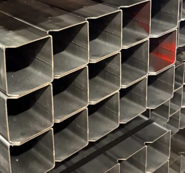 Stacked metal square tubing arranged in a grid pattern.