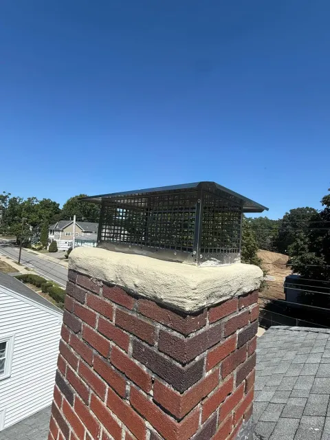 Chimney cap black steel blue sky — Chimney Goat project