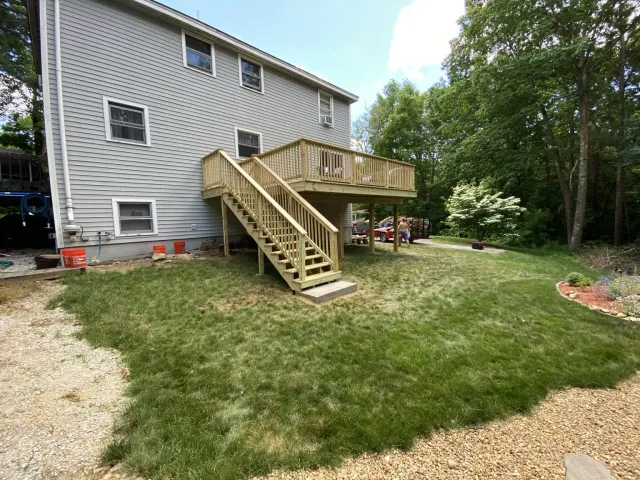 New elevated wood deck with stairs