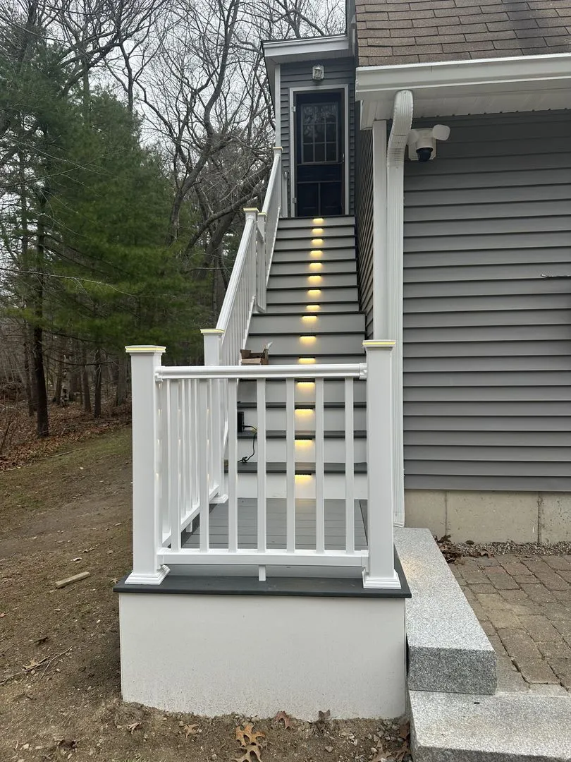Entry stairs with integrated riser lighting