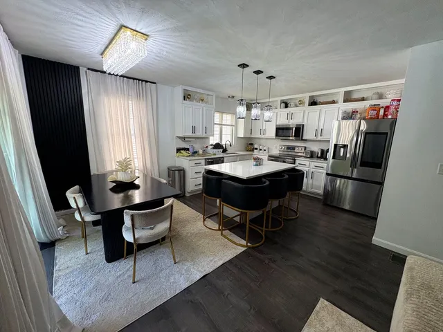 Bright, modern kitchen and dining room cleaned by RiseUp Cleaning in Worcester County