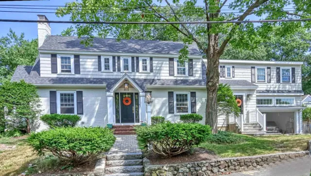 Whole house renovation in Melrose, MA by PEGASUS Design-to-Build with refreshed exterior and curb appeal.-optimized