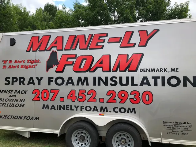 Maine-ly Foam spray foam insulation trailer, Denmark Maine, showing the phone number 207-452-2930 and the slogan "If It Ain't Tight, It Ain't Right"