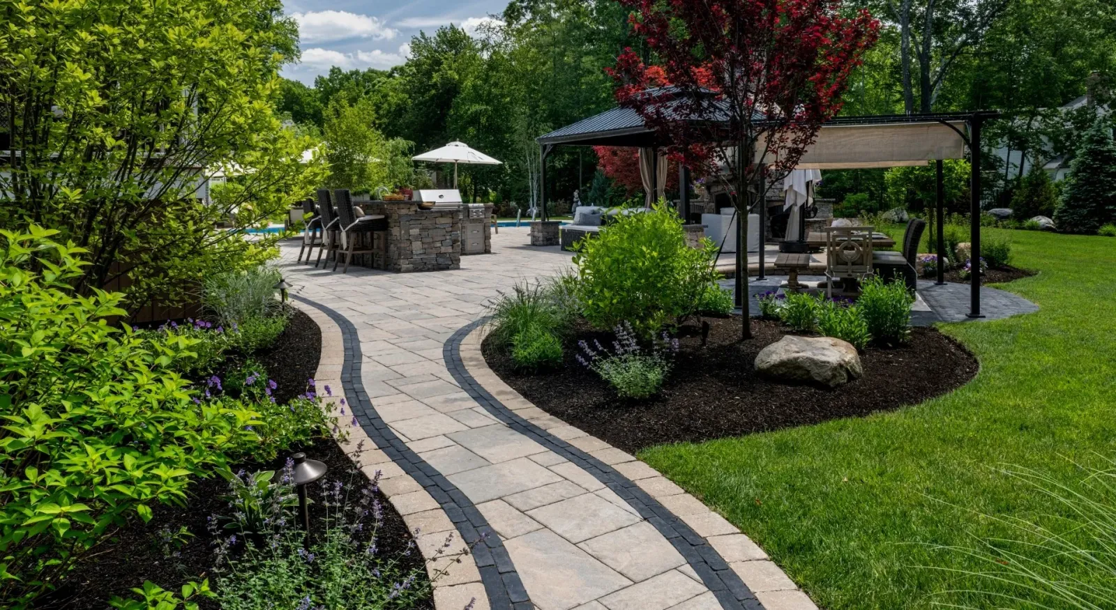 landscape maintenance with beautiful pavements showing an outdoor kichen