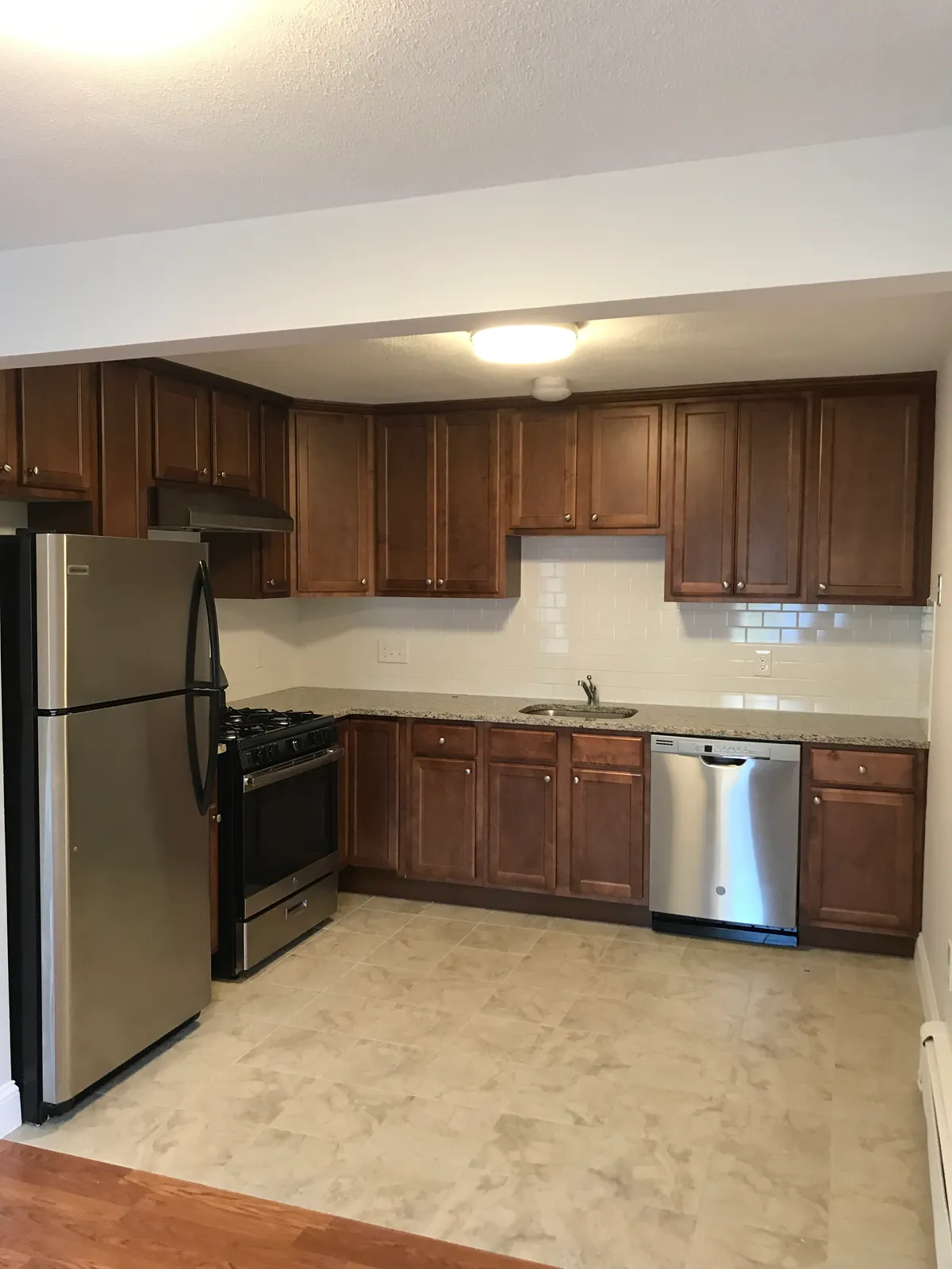 Kitchen remodel with wood cabinets