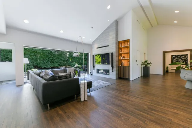 Open-plan living room with vaulted ceiling
