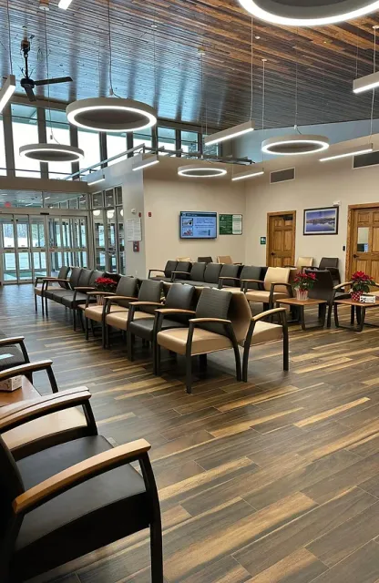Interior sitting area with lots of chairs
