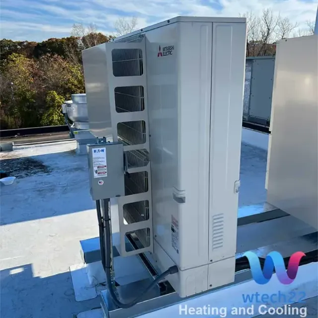 HVAC unit on a rooftop with the logo of