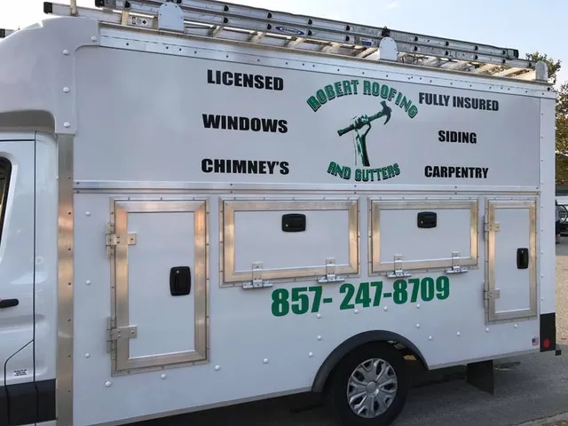 Robert Roofing & Gutters branded service truck