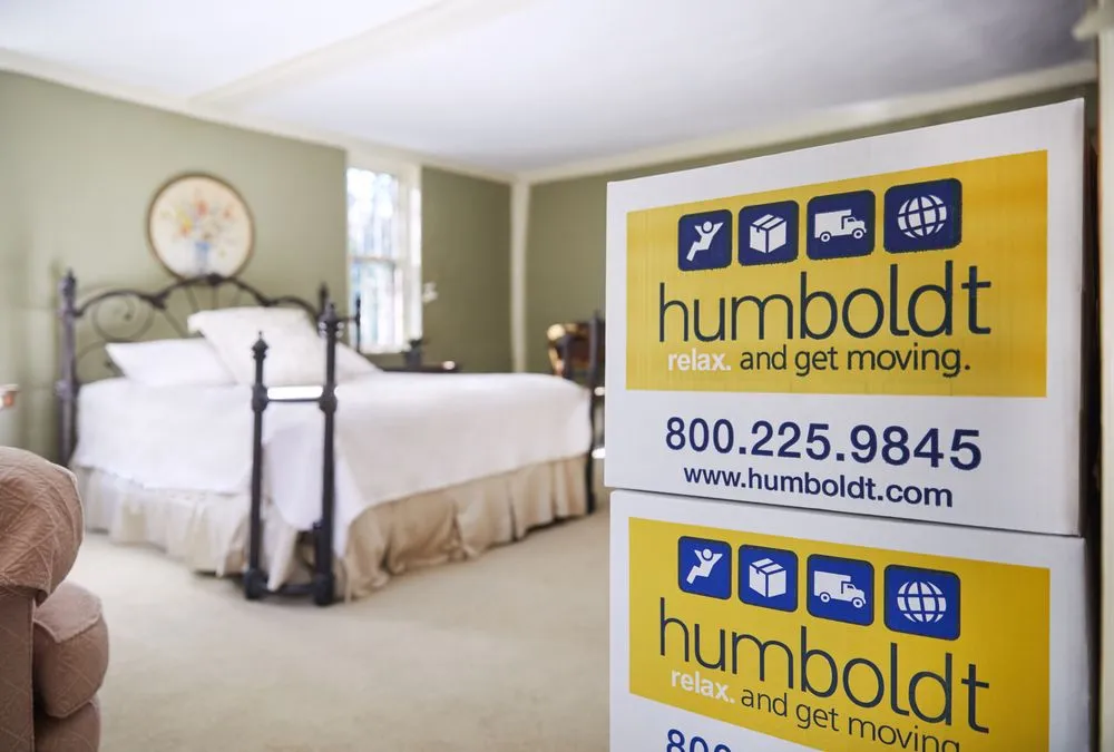 Humboldt cartons staged in a bedroom