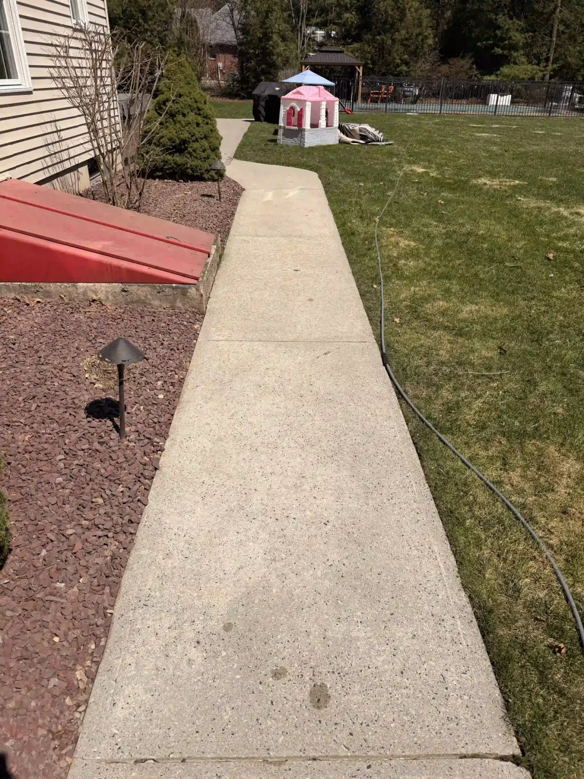 Driveway pressure washing in Southwick, MA — after