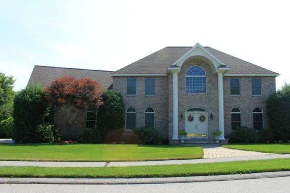 Brick-front colonial with two-story portico