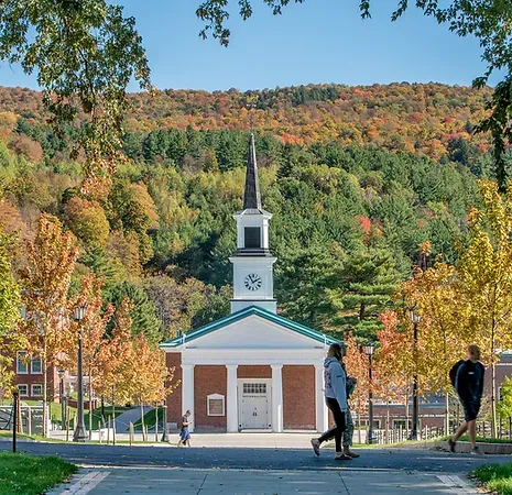Campus chapel shown with Vermont mountains in the background, students in foreground Norwich University Memorial Plaza Crowley Cottrell LLC Landscape Architecture