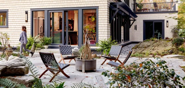 Juniper Design Build's Cape Haven house construction project patio with firepit
