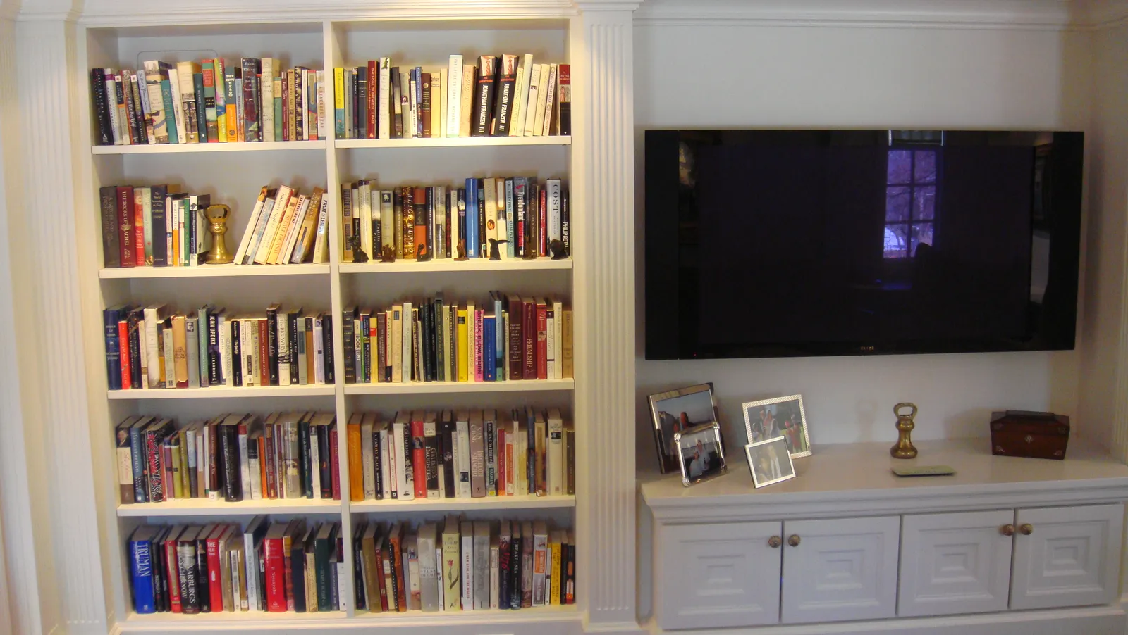 Custom built-in bookshelves and media wall