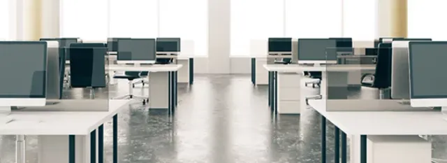 Modern office space with desks and computers, prepared for NYC professional moving services.