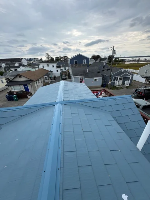 Corroded Fastener & Seam Repair on a Metal Roof — Hampton, NH in Hampton, NH