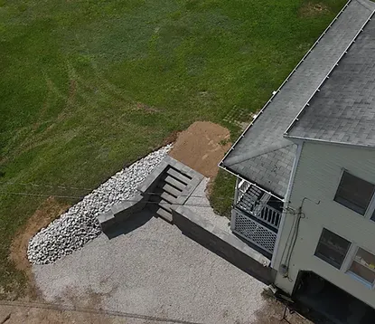 Hardscaping services including paver patios and retaining walls in Rhode Island and Massachusetts