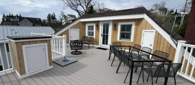 Roof replacement and siding project with a rooftop deck in Westport, CT