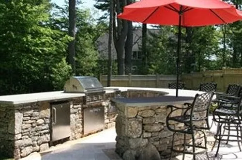 Stone Bar with Built-In Grill, Refrigerator& Trash Center by New View