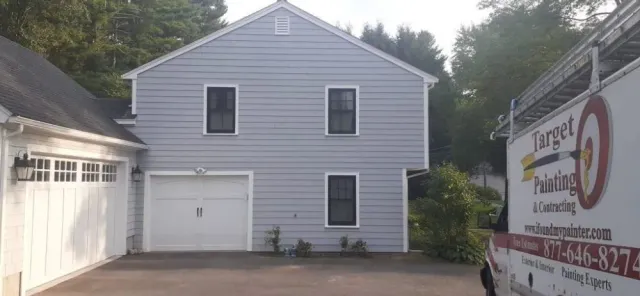 Failing siding stripped, repaired and repainted — after