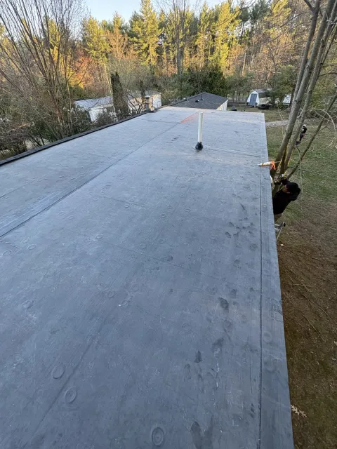 New asphalt shingle roof on a colonial home in New Hampshire