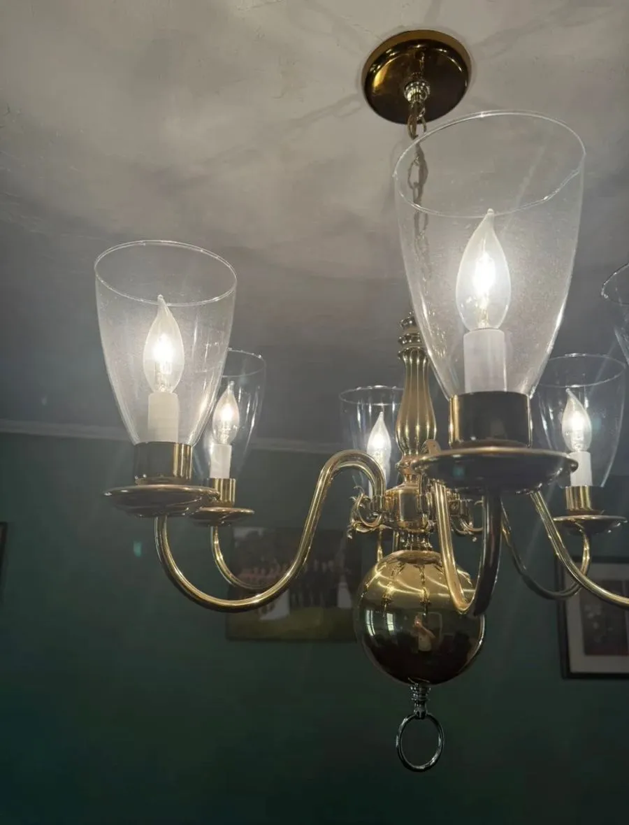 Dusty brass chandelier before polishing
