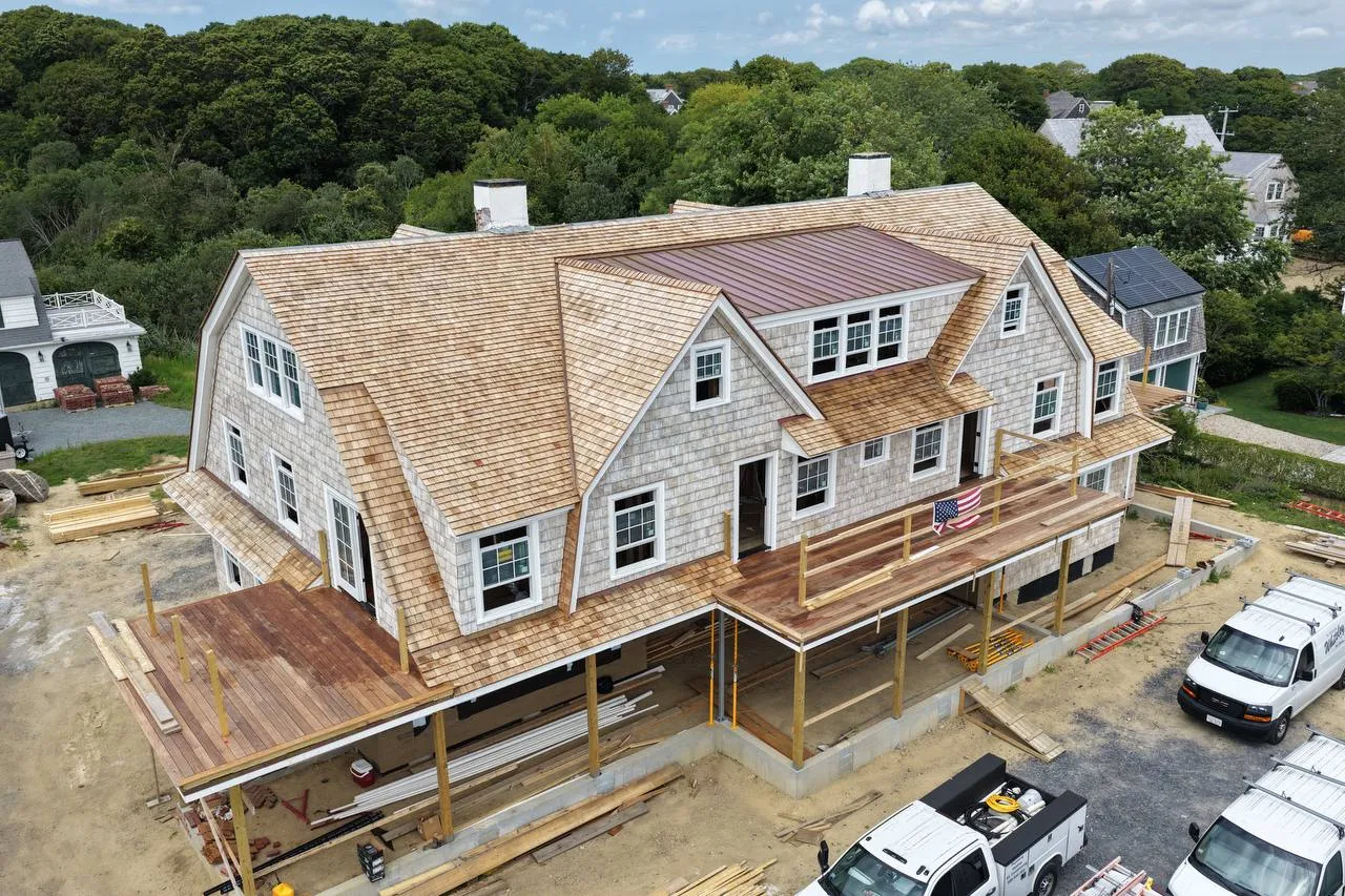 Hyannis Port estate with red cedar roof and copper standing seam details