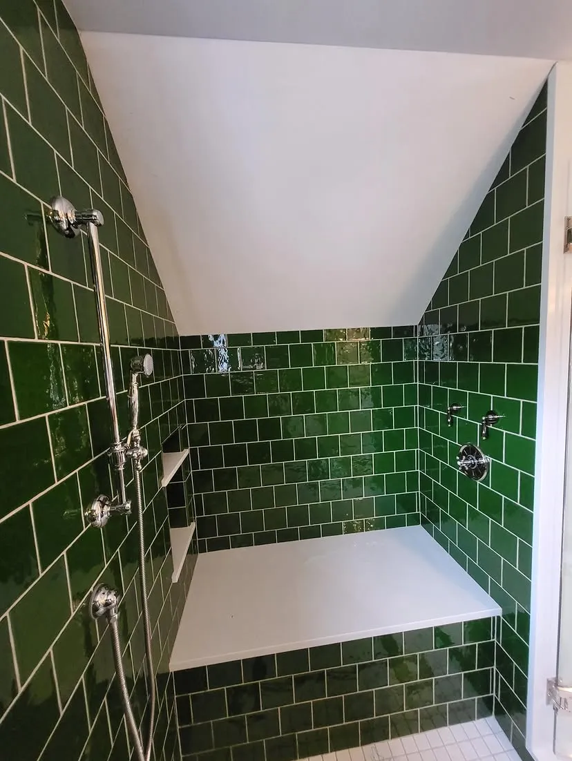 Custom tiled walk-in shower with rain head and handheld sprayer installed by Aroso Plumber Methuen
