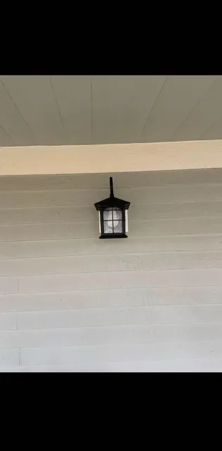 Exterior sconce installation