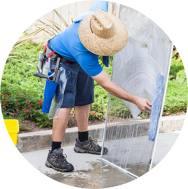 Screen getting cleaned by Vermont Home Wash technician
