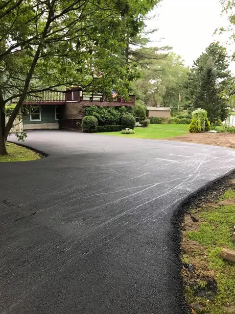 work photo from dmgtruckingpaving.com