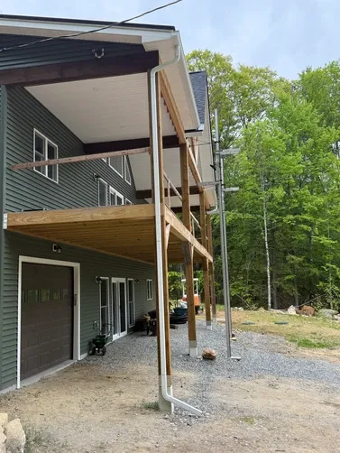 Two story downspout on new build home