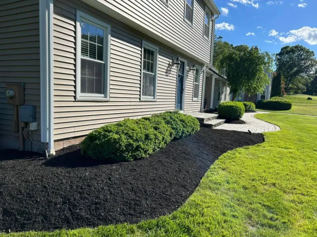 Enhance your landscape's health and appearance with our professional mulch installation service, providing moisture retention, weed control, and soil protection while adding a visually appealing touch to your outdoor spaces. for Dibs Landscaping LLC in Cheshire, CT