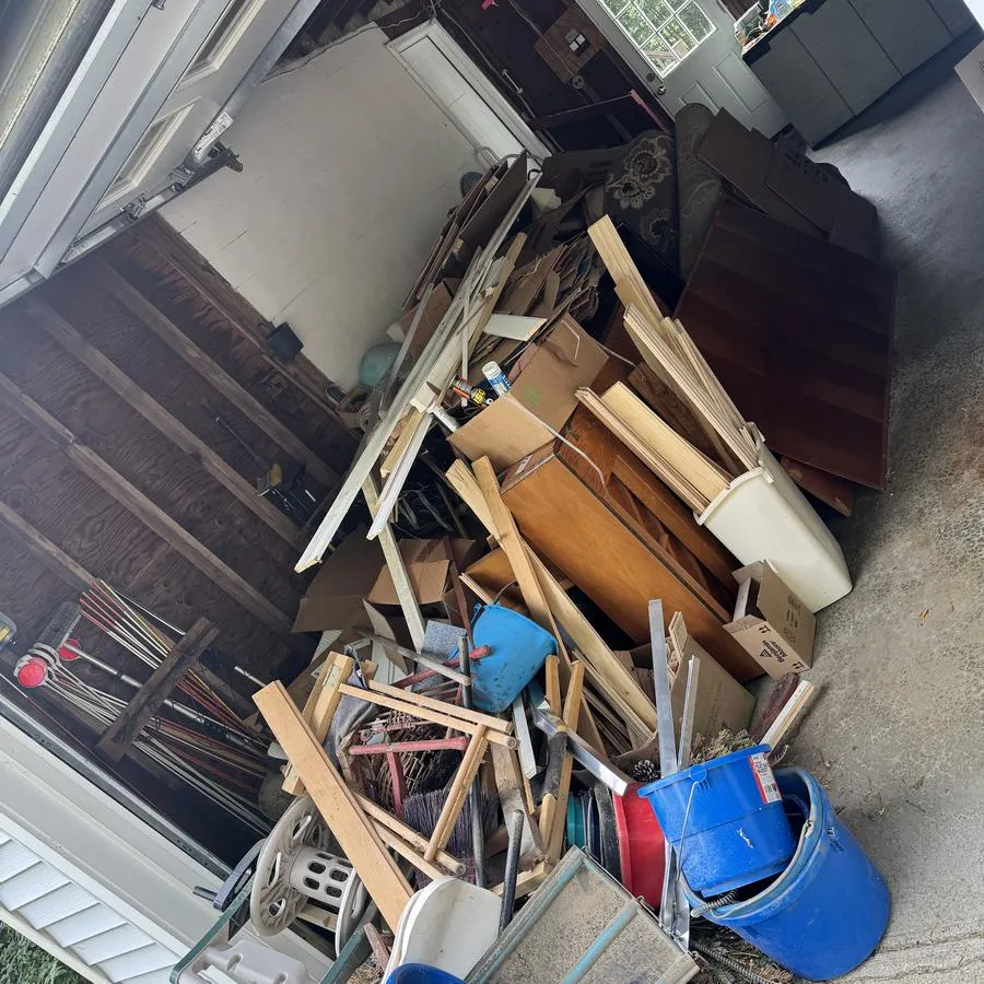 Garage cleanout before — Joe's Junk Removal & Demolition