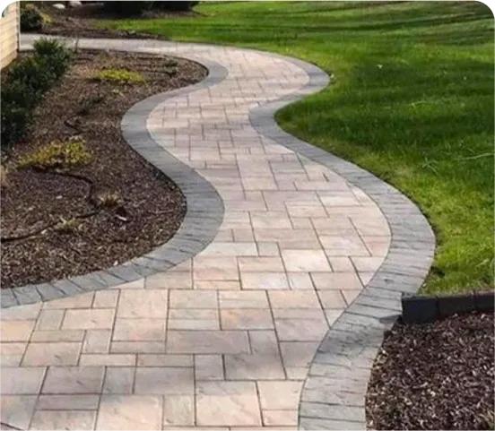 Bluestone walkway leading through a Cape Cod yard