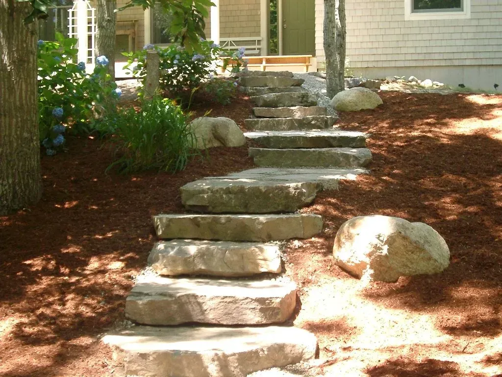 A set of stone steps leading up to a house